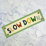 Slow Down Embroidered Banner